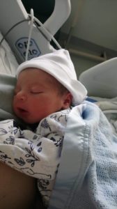 Newborn Hypnobub sleeping in mothers arms