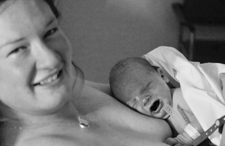 Mother births and receives her own baby