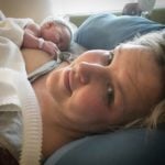 Hypnobirthing mum Nina holding her newborn baby