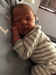 Baby sleeping on mums chest