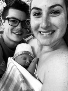 Mum Tayler and Husband having skin to skin with their newborn baby