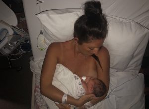 Melissa having skin to skin with baby navy after Caesarean