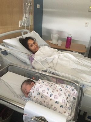 New mum Gemma and Baby resting