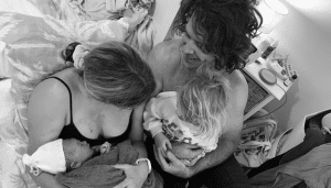 family with newborn baby