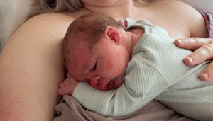 Newborn baby and mother